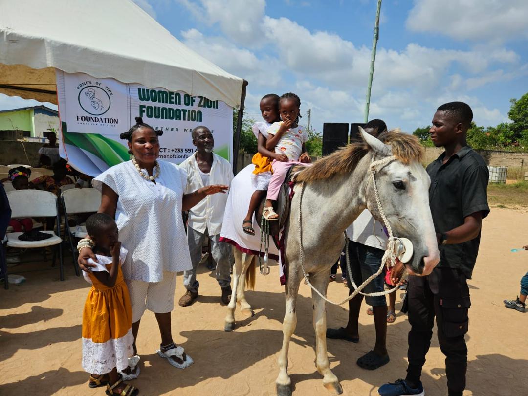 Children experiencing horse riding